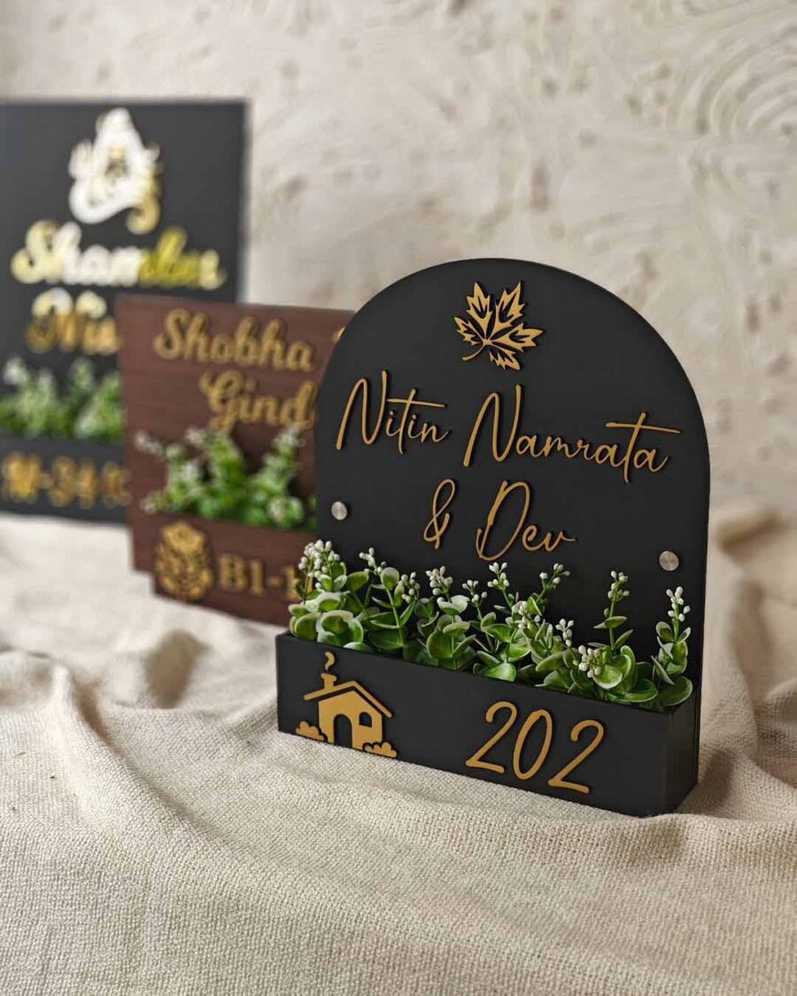UHNB0023- Elegant Roots – Black & Gold Acrylic Name Board with Transparent Layer Our Dome Shaped Nameplate Just Got A Leafy 900x1125